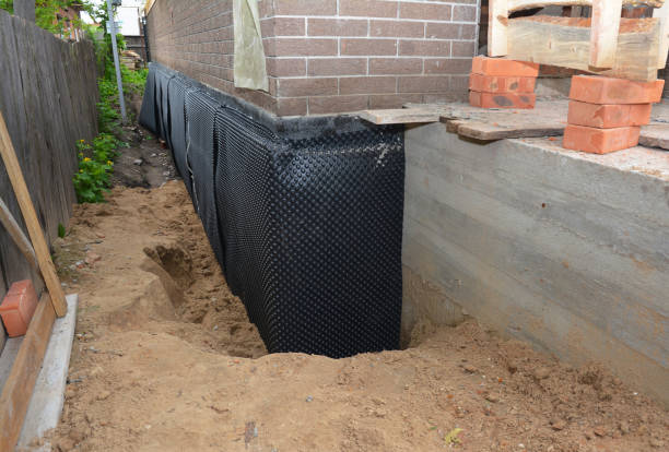 Happy homeowners after waterproofing job in Brush Prairie